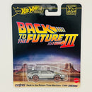 2025 Hot Wheels Premium Pop Culture Back To The Future Time Machine 1955 DeLorean DMC-12 Volver Al Futuro plata metálico Llantas de Ferrocarril