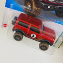 2022 Hot Wheels Mud Studs 21 Ford Bronco rojo metálico BLOR