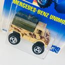 1993 Hot Wheels Mercedes Benz Unimog 239 beige camuflado SB base ZAMAC