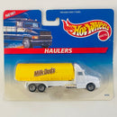 1997 Hot Wheels Haulers Milk Dudes Caramels Camión Cisterna blanco con amarillo 7SP