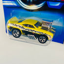 2006 Hot Wheels Tooned 69 Camaro Z28 124 amarillo con flamas 5SP