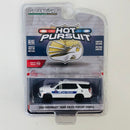 2022 Greenlight Hot Pursuit Houston Metro Police 2021 Chevrolet Tahoe Police Pursuit Vehicle blanco policial Llantas de Goma
