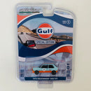 2023 Greenlight GULF Special Edition Series 1 1974 Volkswagen GOLF GTI celeste con naranja Llantas de Goma