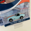 2023 Greenlight GULF Special Edition Series 1 1965 Shelby Cobra 427 S/C celeste con naranja Llantas de Goma