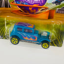 2014 Hot Wheels Walmart Exclusive Happy Easter Series 32 Ford Vicky turquesa 5SP base ZAMAC