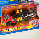 2010 Jada NASCAR 1:43 Motorized Pull Back Jeff Gordon 24 DuPont Pepsi Chevrolet Impala SS negro con flamas Llantas Goodyear