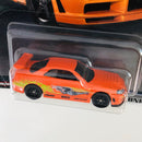 2023 Hot Wheels Premium Fast & Furious Rápidos y Furiosos Nissan Skyline GT-R BNR34 naranja Llantas de Goma RR - Color Paul Walker's Supra