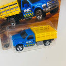 2025 Matchbox MBX Construction Ford F-350 Stake Bed Truck azul con amarillo