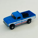 2021 Matchbox Walmart Exclusive Truck Series 62 Nissan Junior azul con blanco - Loose/Suelto