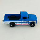 2021 Matchbox Walmart Exclusive Truck Series 62 Nissan Junior azul con blanco - Loose/Suelto