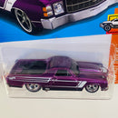 2024 Hot Wheels Super Treasure Hunt HW Hot Trucks 71 El Camino Chevrolet morado spectraflame Llantas de Goma RR - Detalle Marcas de Piocha