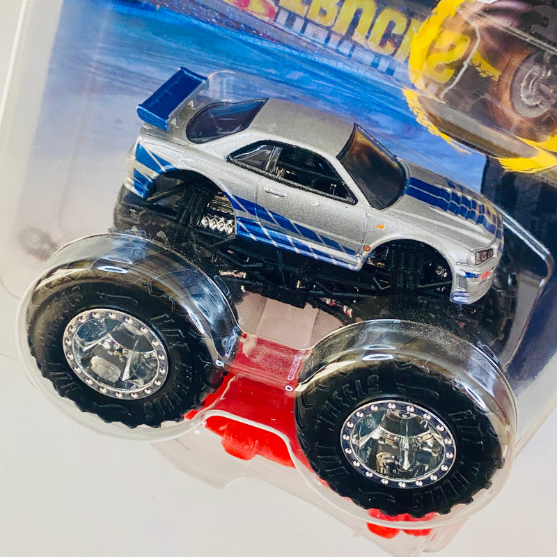 2025 Hot Wheels Monster Trucks Fast & Furious Rápidos y Furiosos Nissan Skyline GT-R R34 plata metálico MT con Auto Aplastable