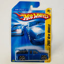 2007 Hot Wheels New Models Chevy Silverado azul metálico OH5 Primera Edición - Incluye Moto Extraíble