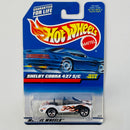 1999 Hot Wheels Shelby Cobra 427 S/C 1024 blanco 5SP base ZAMAC - Detalle Burbuja