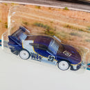 2023 Hot Wheels Premium Car Culture Race Day Porsche 935 blanco con morado Llantas de Goma RR