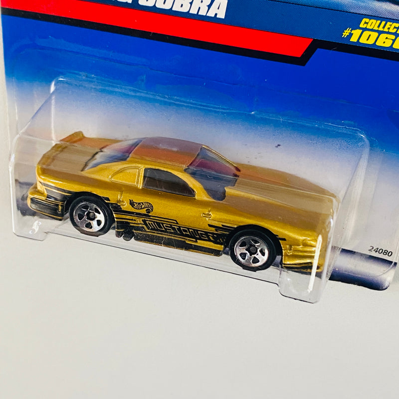 1999 Hot Wheels Ford Mustang Cobra 1066 dorado metálico 5SP