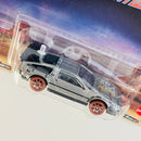 2025 Hot Wheels Premium Pop Culture Back To The Future Time Machine 1955 DeLorean DMC-12 Volver Al Futuro plata metálico Llantas de Ferrocarril