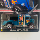 2018 Hot Wheels Collector Edition Mail-In Exclusivo K-Mart Custom 38 Ford C.O.E. azul spectraflame Redline Llantas de Goma RR base ZAMAC - Detalle Rotura en Burbuja