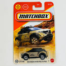 2026 Matchbox MBX Adventure 2023 Nissan Ariya Pole to Pole dorado metálico Primera Edición