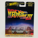 2025 Hot Wheels Premium Pop Culture Back To The Future Time Machine 1955 DeLorean DMC-12 Volver Al Futuro plata metálico Llantas de Ferrocarril base ZAMAC