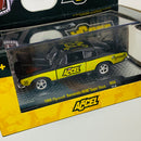2024 M2 Machines Limited Edition 1/8,250 Accel 1968 Plymouth Barracuda HEMI Super Stock R88 negro con amarillo Llantas de Goma
