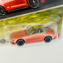 2025 Matchbox MBX Road Trip Mercedes AMG SL 63 naranja metálico