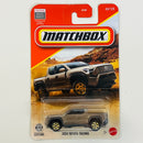 2026 Matchbox MBX Adventure 2024 Toyota Tacoma marrón