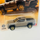2026 Matchbox MBX Adventure 2024 Toyota Tacoma marrón