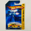 2006 Hot Wheels New Models Datsun 240Z amarillo Y5 Primera Edición