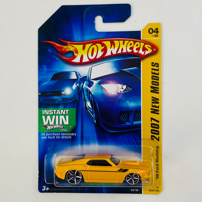 2007 Hot Wheels New Models 69 Ford Mustang amarillo metálico OH5 Primera Edición