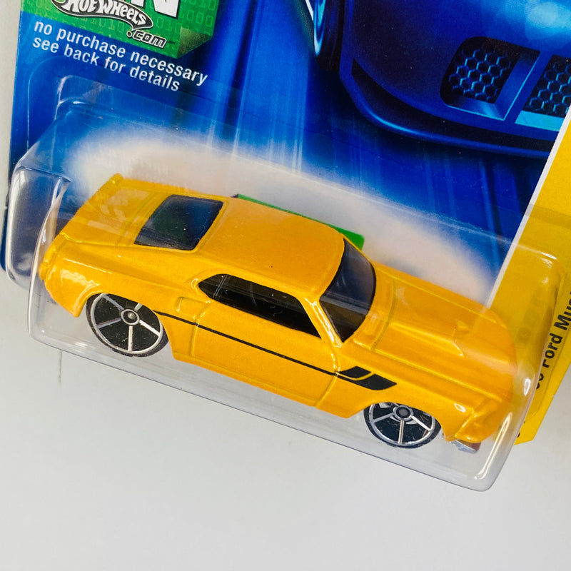 2007 Hot Wheels New Models 69 Ford Mustang amarillo metálico OH5 Primera Edición