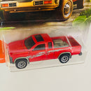 2020 Matchbox MBX Jungle 95 Nissan Hardbody D21 rojo Primera Edición