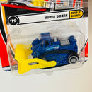 2002 Matchbox 50th Anniversary Built It Right! Super Dozer azul metálico con Pala Frontal Móvil - Detalle Burbuja