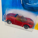 2008 Hot Wheels New Models 2008 Tesla Roadster rojo metálico 10SP Primera Edición