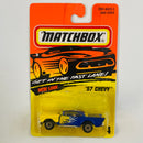 1996 Matchbox 57 Chevy 4 azul con flamas amarillas
