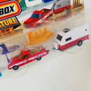 2025 Matchbox Adventure Pack MBX Surfing II - 61 Ford Ranchero, MBX Travel Trailer II y 3 Figuras de Playa y Surf