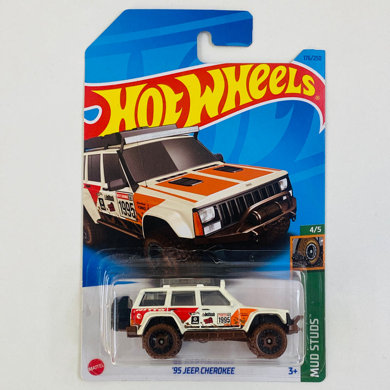 2023 Hot Wheels Treasure Hunt Mud Studs 95 Jeep Cherokee blanco BLOR