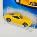 2010 Hot Wheels New Models Nissan 370Z amarillo PR5 Primera Edición - Detalle Burbuja