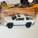 2025 Matchbox MBX Adventure 2024 Toyota Tacoma blanco Primera Edición
