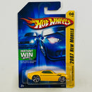 2007 Hot Wheels New Models 69 Ford Mustang amarillo metálico OH5 Primera Edición