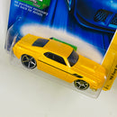 2007 Hot Wheels New Models 69 Ford Mustang amarillo metálico OH5 Primera Edición
