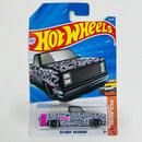 2026 Hot Wheels Truckin Along 83 Chevy Silverado negro PR5