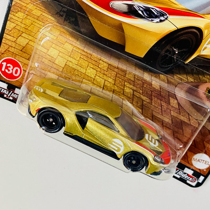 2025 Hot Wheels Premium Boulevard 17 Ford GT dorado metálico Llantas de Goma RR
