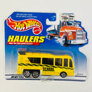 1999 Hot Wheels Haulers Modern Bus Hauler School amarillo 5SP Primera Edición - Detalle Burbuja