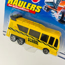 1999 Hot Wheels Haulers Modern Bus Hauler School amarillo 5SP Primera Edición - Detalle Burbuja