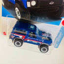 2023 Hot Wheels HW J-Imports Nissan Patrol Custom azul BLOR Primera Edición Tarjeta Internacional