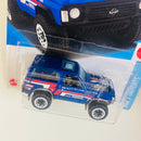 2023 Hot Wheels HW J-Imports Nissan Patrol Custom azul BLOR Primera Edición