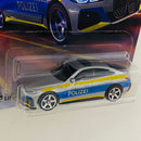 2025 Matchbox MBX Rescue 2023 BMW i4 Police Sedan plata metálico Primera Edición