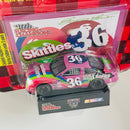 1998 Racing Champions 50th Anniversary NASCAR Ernie Irvan 36 Skittles Pontiac Grand Prix rosado Llantas Goodyear