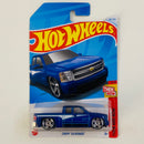 2024 Hot Wheels Then and Now Chevy Silverado azul PR5 Tarjeta internacional
